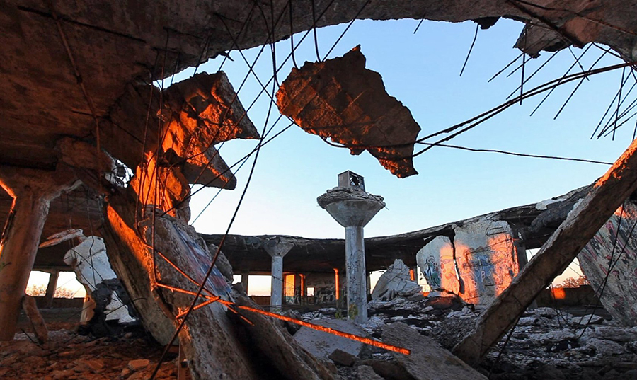 A television sits atop a column in a Packard building in 2010. Free Press-produced film “Packard: The Last Shift” is primarily the work of three-time Emmy winner Brian Kaufman.