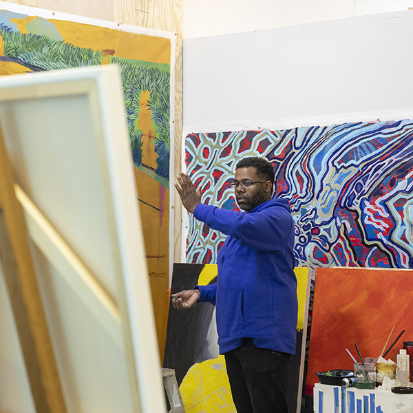 Senghor Reid paints at his studio